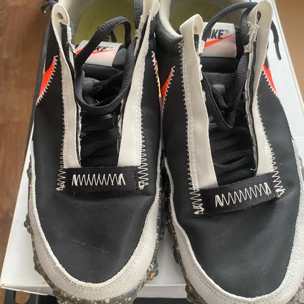 Nike Black and White Sneakers with Red Details